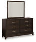 Neymorton California King Upholstered Panel Bed with Mirrored Dresser and 2 Nightstands